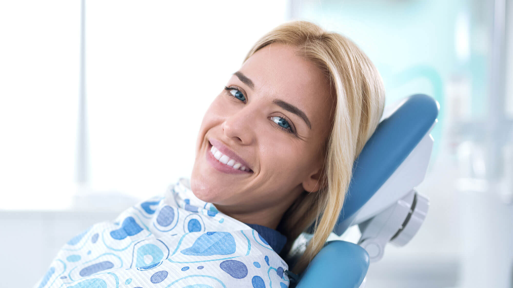 smiling_woman_in_chair